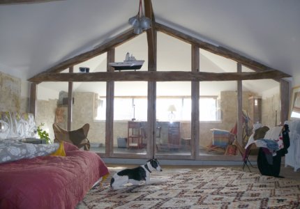 Cloison vitrée avec menuiseries en bois - après travaux